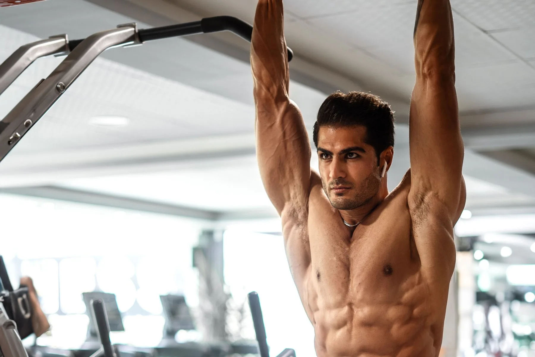 A strong, athletic man training in the gym